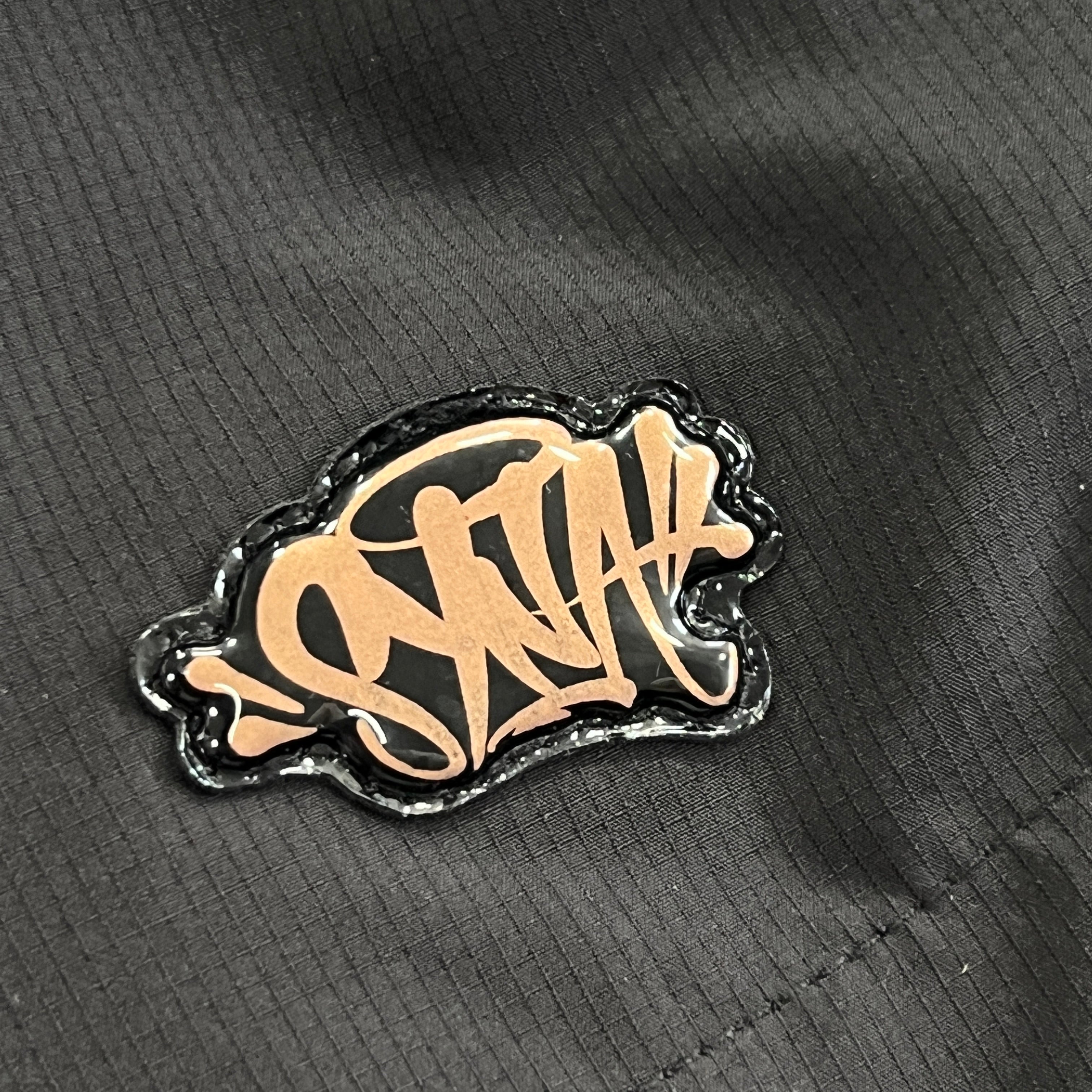 Syna World Vortex Track Shorts- Black / Rose Gold